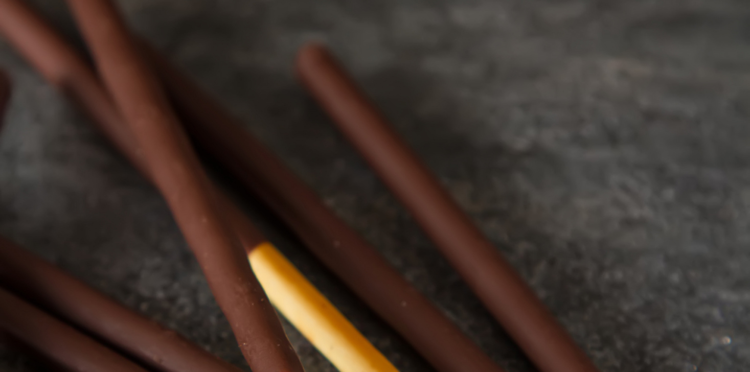 Box for cookies with bright flogging. Japan sweets. dark background.